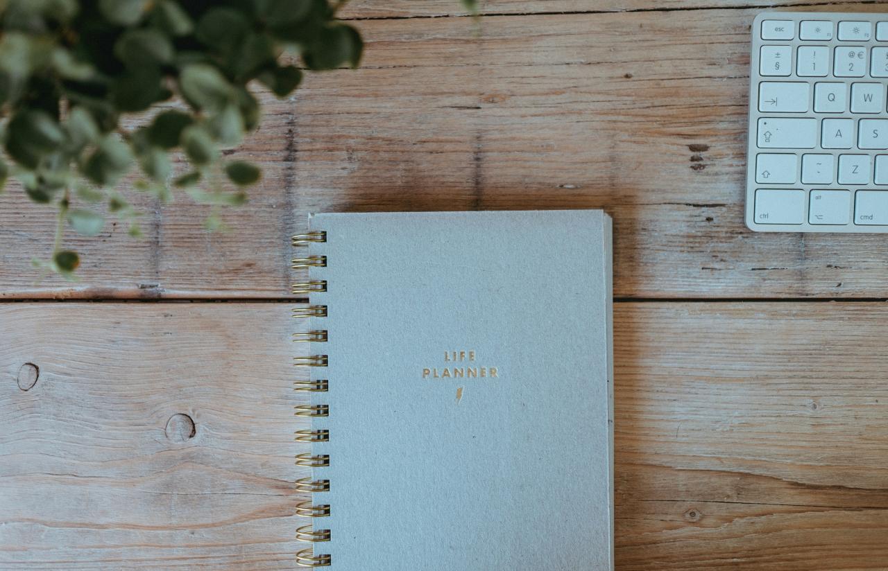 Calendar and written list for tracking a temporary spending pause