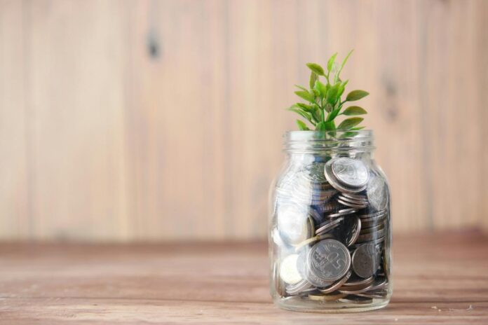 Savings jar representing money reserved for a planned expense